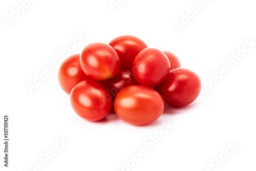 Group of ripe red cherry tomatoes on a white background
