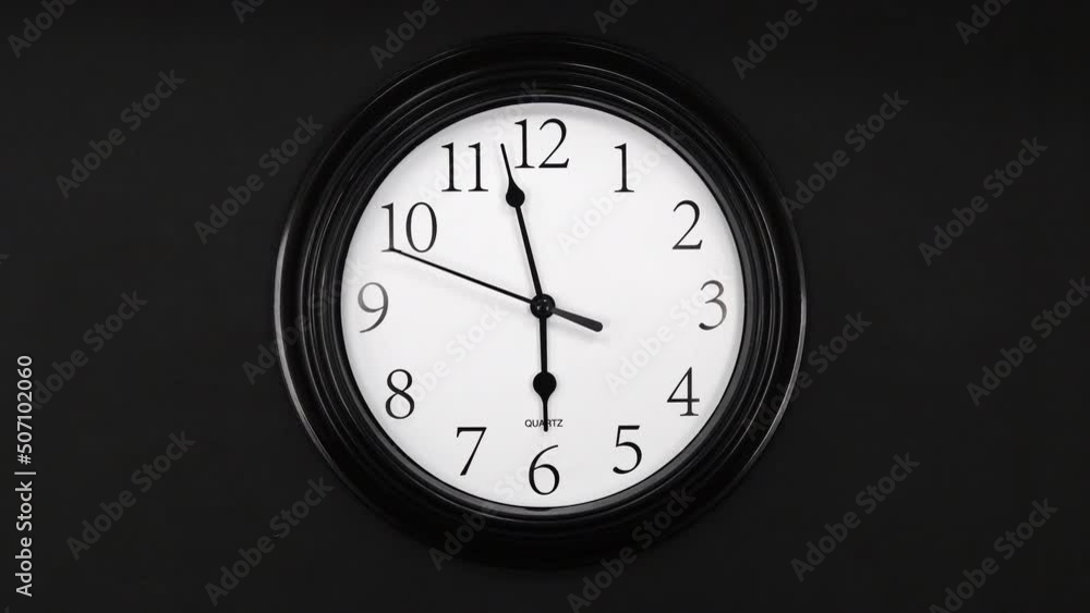 Classic Black And White Wall Clock With Black Background. Black Hands On The Clock. Timelapse. Wall Clock Face Beginning Of Time Of 6.00 Am Or Pm. 4k. ProRes. Classic Black And White Wall Clock With Black Background. Black Hands On The Clock. Timelapse. Wall Clock Face Beginning Of Time Of 6.00 Am Or Pm. 4k. ProRes.