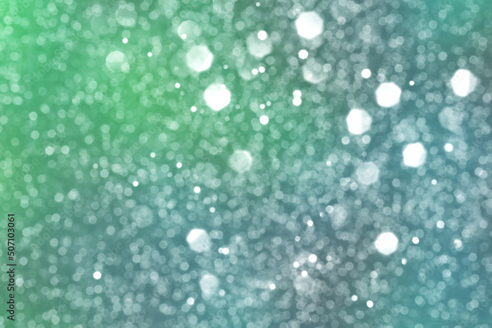 Summer green and blue sparkling glitter bokeh background, abstract defocused lights texture