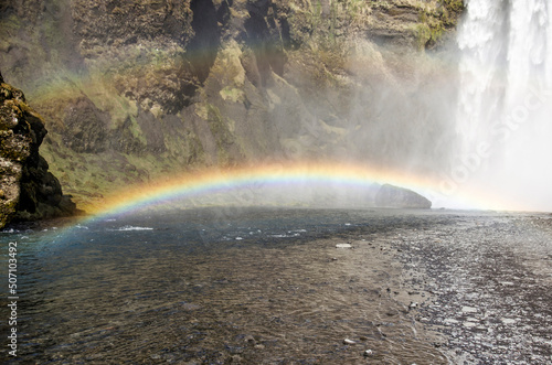 Rainbow above the Skoga river next to the famous Skogafoss waterfall in southern Iceland