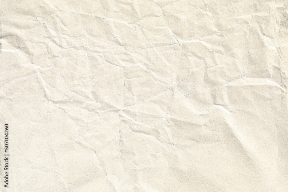 Fototapeta premium light beige crumpled paper background texture
