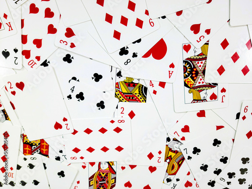 Scattered playing cards collection background