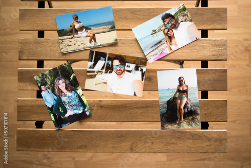 several photos of a couple in love on their summer vacations, on the beaches of Mallorca. on a wooden table with holes in it.