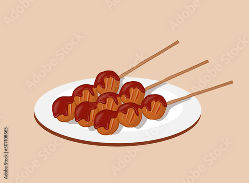 bakso bakar or grilled meatball with sauce photo