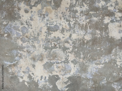 Texture of old concrete wall.Concrete wall of light grey color cement texture background.Grey pastel rough crack cement texture stone concrete,rock plastered stucco wall; painted flat fade background. © prateek