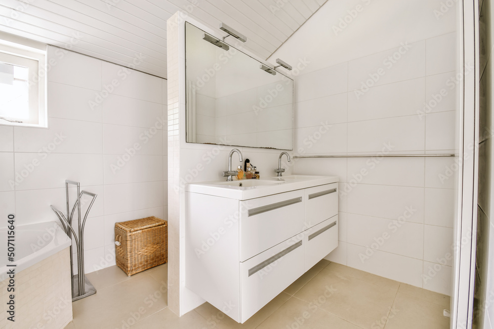 Drawers with sinks and mirror on partition Drawers with sinks and mirror on partition