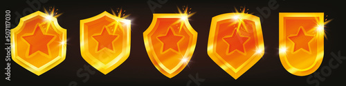 Golden shield vector icon set, game UI trophy badge, metal award heraldic logo, security emblem 3D kit. Victory reward shiny medal assets isolated yellow protective armor. Champion honor golden shield