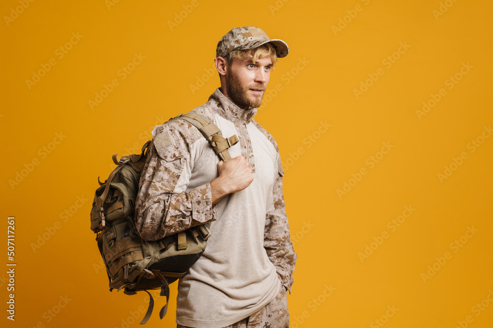 White military man wearing uniform posing and looking aside White military man wearing uniform posing and looking aside