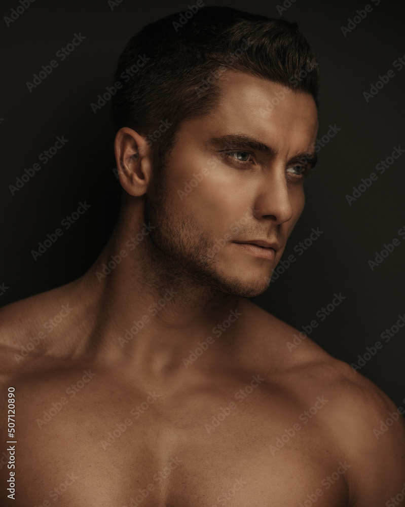 Studio profile portrait of handsome male model Studio profile portrait of handsome male model