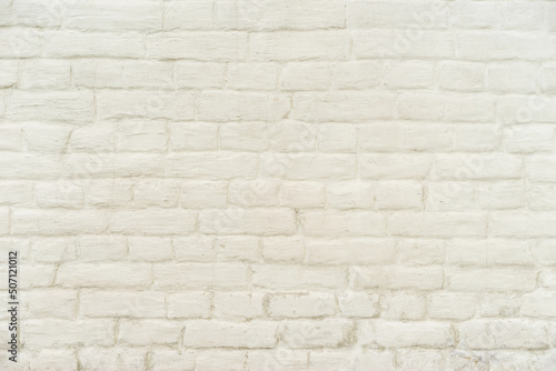 Old white brick wall. Clouseup background.