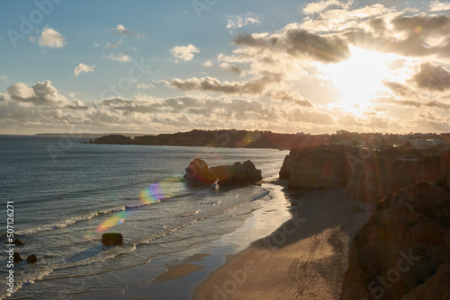 Top view of the Praia dos Careanos at sunset in Portimao, Portugal. photo