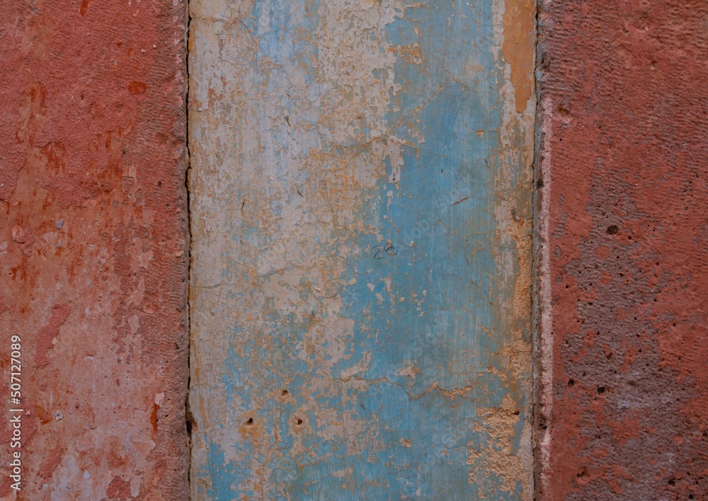 peeling and weathered wall. close-up image