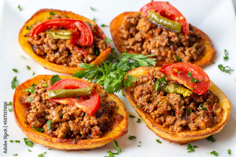 Traditional Turkish food; baked potato dish with minced meat, Turkish name; Patates karniyarik Traditional Turkish food; baked potato dish with minced meat, Turkish name; Patates karniyarik