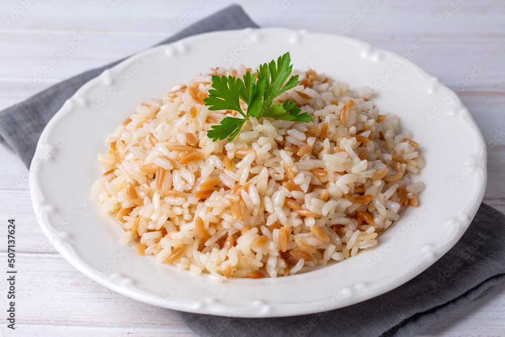 Traditional delicious Turkish food; Turkish style rice pilaf (Turkish name; Arpa sehriyeli pirinc pilavi) Traditional delicious Turkish food; Turkish style rice pilaf (Turkish name; Arpa sehriyeli pirinc pilavi)