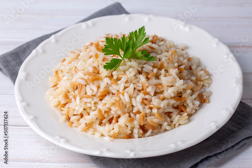 Traditional delicious Turkish food; Turkish style rice pilaf (Turkish name; Arpa sehriyeli pirinc pilavi)