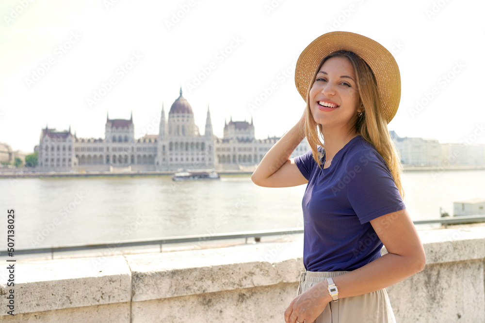 Portrait of beautiful smiling tourist woman visiting Budapest, Hungary