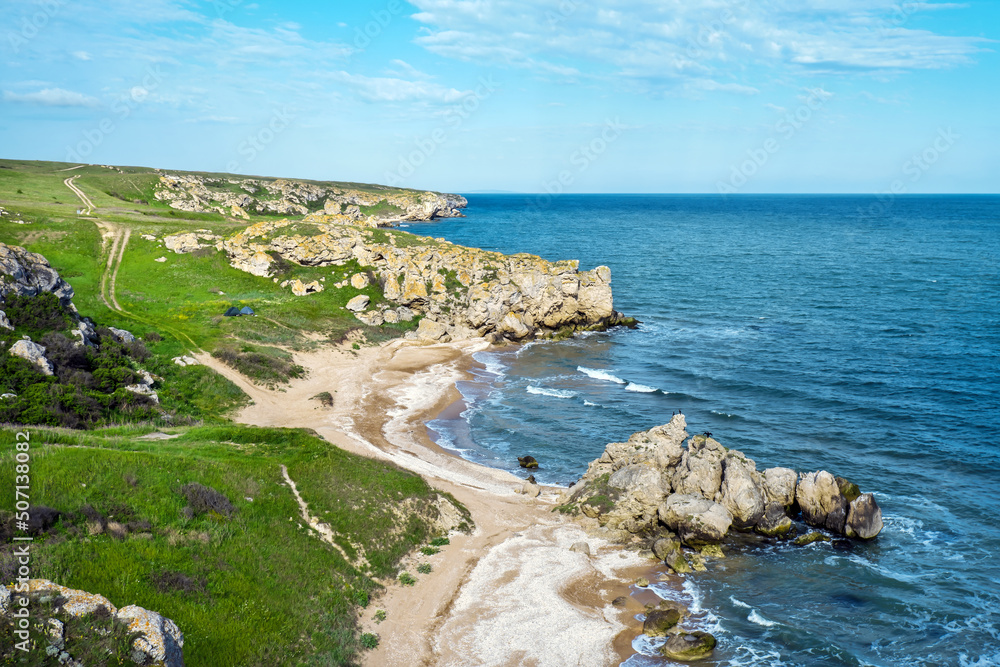 Rocks, beaches and beautiful turquoise sea water. Exotic beach. Tranquility of turquoise sea water. Beautiful landscape. Composition of nature. General's Beaches. Crimea.