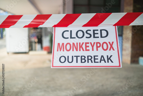 Monkeypox outbreak concept. Message paper and barriers, to closed service during the monkeypox virus outbreak. © iSomboon