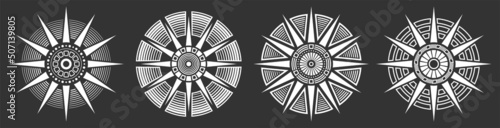 Set of four abstract circular ornaments. Decorative patterns isolated on black background. Tribal ethnic motifs. Stylized sun symbols. Stencil tattoo and prints Vector monochrome illustration.