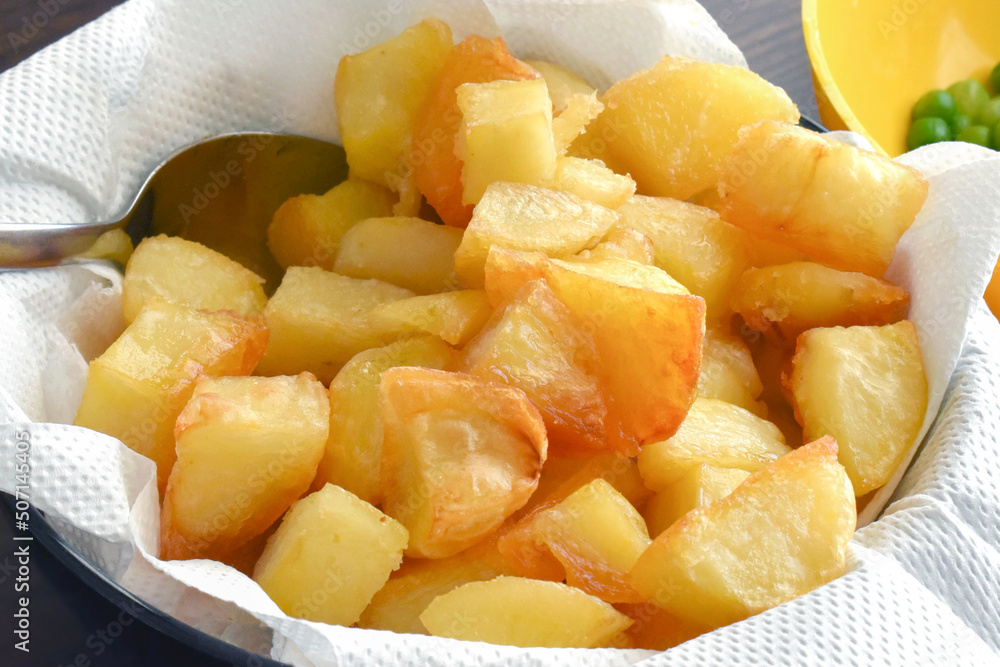 Oven roasted potatoes in a bowl. Oven roasted potatoes in a bowl.