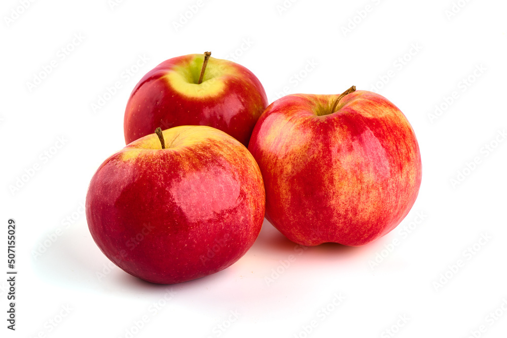 Shiny Red ripe apples, isolated on white background. Fresh raw organic fruits. Shiny Red ripe apples, isolated on white background. Fresh raw organic fruits.