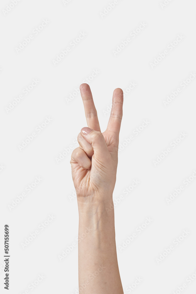 Counting on fingers female hand, two or V letter on white. Counting on fingers female hand, two or V letter on white.