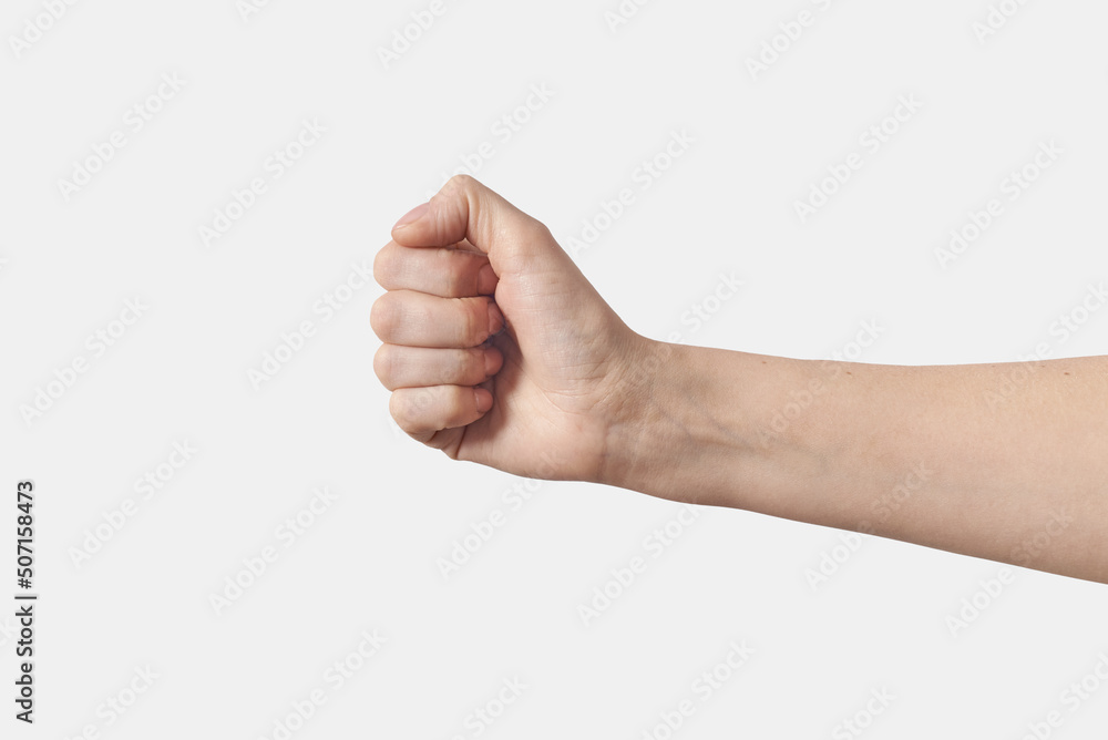 Female hand in fist, A letter in sign language horizontal. Female hand in fist, A letter in sign language horizontal.