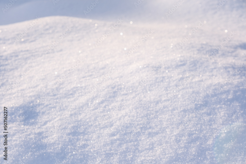 Winter snow. Snow texture Top view of the snow. Texture for design. Snowy white texture. Snowflakes.