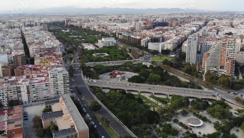 Aerial View Of A Large City With A Big Green Area (Jardi Del Turia Park In Valencia, Spain) photo