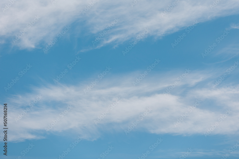 Air clouds in the blue sky.blue backdrop in the air. abstract style for text, design