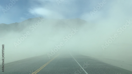 Dust storm over the highway from a dry glacier bed
