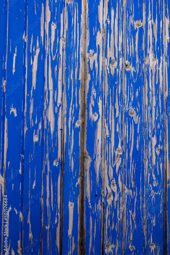 old wooden cracked blue painted door old wooden cracked blue painted door