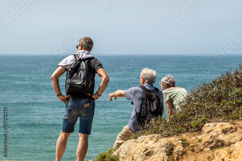 Elder people hiking on cliffs