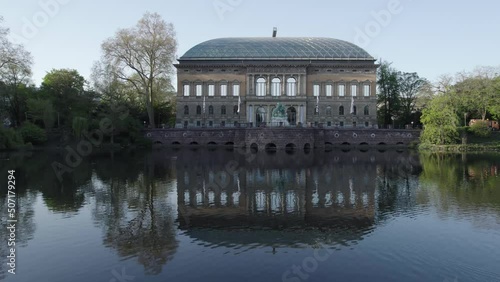 Aerial over water of historic building of modern art in Dusseldorf, Germany photo