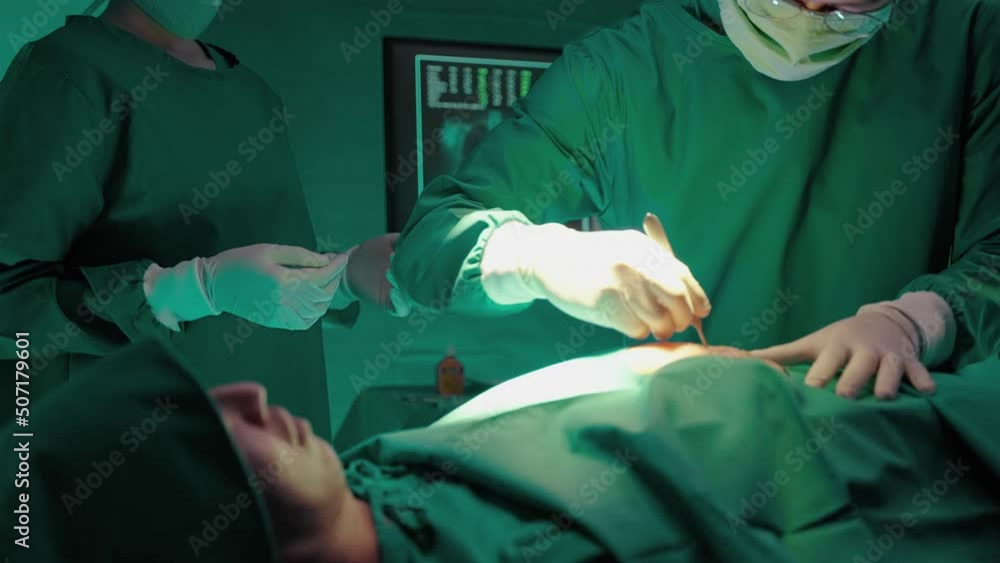 Doctors and medical team are operating a patient in a sterile operating room.Medical concepts and health care treatments
Doctors and medical team are operating a patient in a sterile operating room.Medical concepts and health care treatments