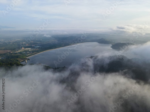 Lake dam and foggy morning cloud