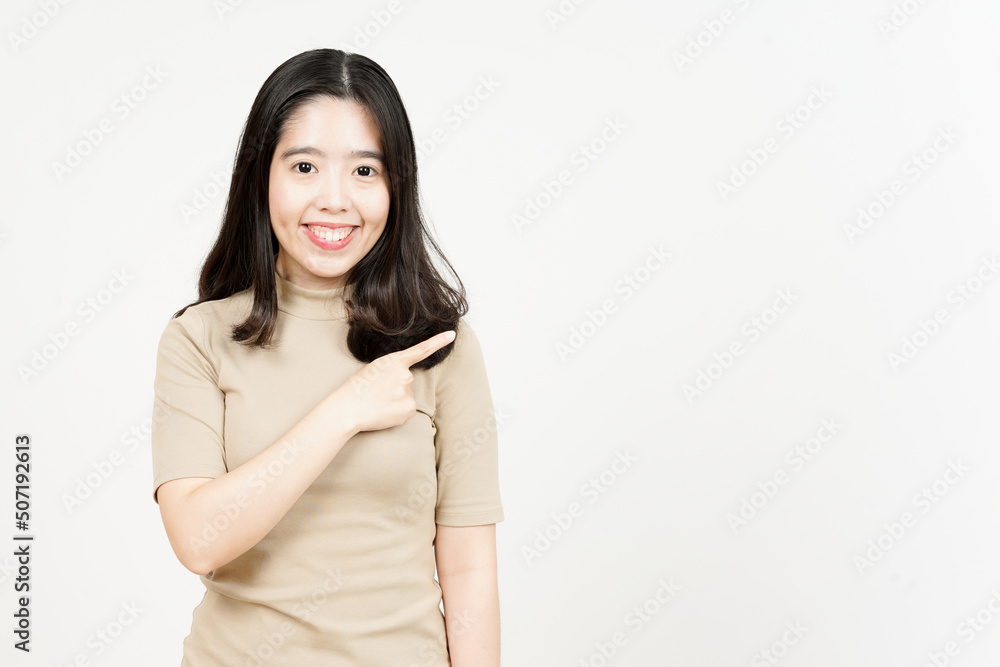 Showing Product and Pointing Side Of Beautiful Asian Woman Isolated On White Background Showing Product and Pointing Side Of Beautiful Asian Woman Isolated On White Background