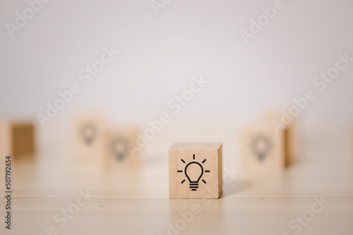 wooden blocks with thinking and idea icon. Concept for creative and design solution.