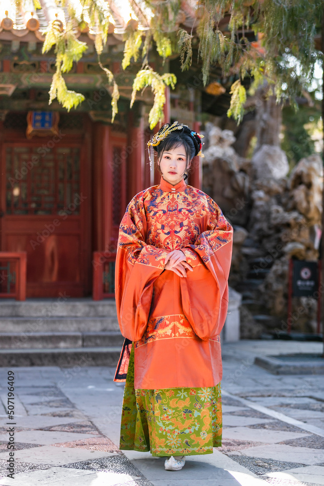 Fototapeta premium Women in classical Chinese costumes in the Forbidden City