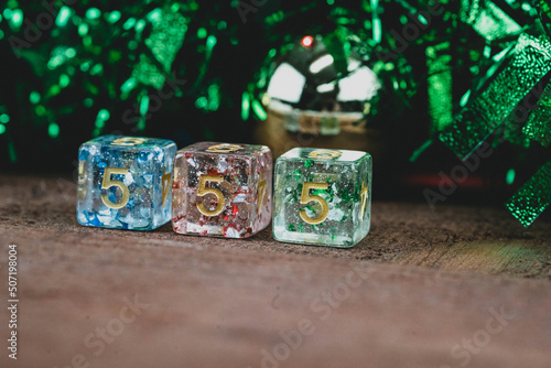 Set of three dice on a Christmas background