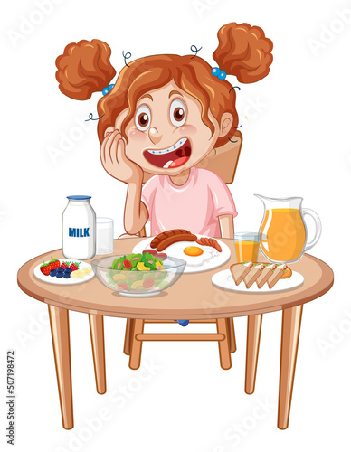 A boy having meal at the table