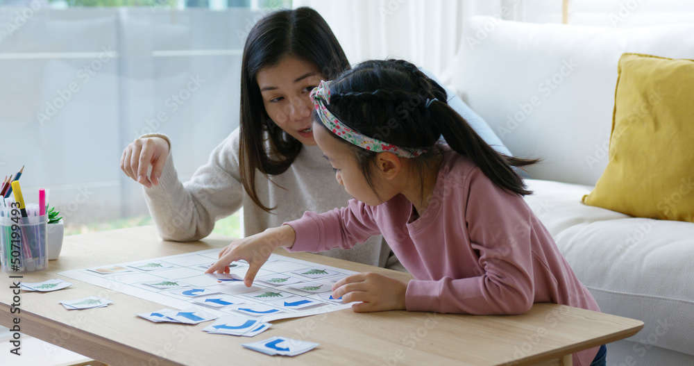 Little cute girl play and learn offline class computer language game Unplugged Coding computing concept with mom for asia kindergarten gen Z smart kids sit at table home sofa. STEM STEAM ICT skill. Little cute girl play and learn offline class computer language game Unplugged Coding computing concept with mom for asia kindergarten gen Z smart kids sit at table home sofa. STEM STEAM ICT skill.