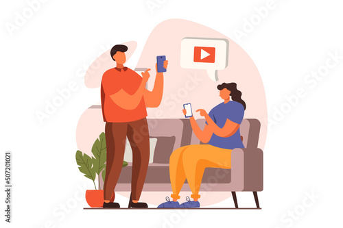 People sit in gadgets web concept in flat design. Man and woman browsing sites, watching video content and sharing each other, chatting using smartphone. Vector illustration with characters scene
