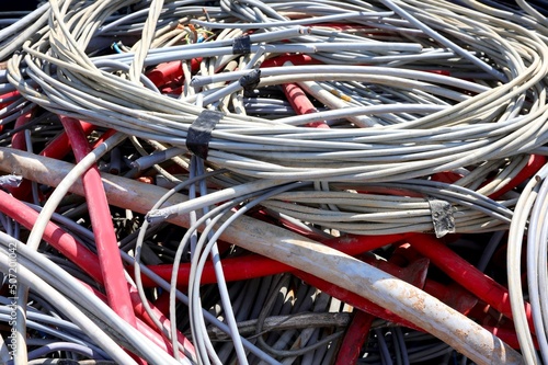 many old electrical cables used for the distribution of electrical energy in homes now deposited in the landfill photo