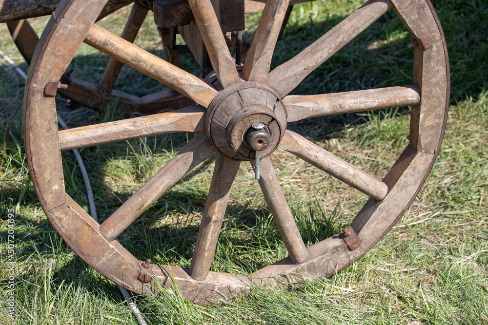 Old wooden cart with wooden wheels. Old wooden cart with wooden wheels.