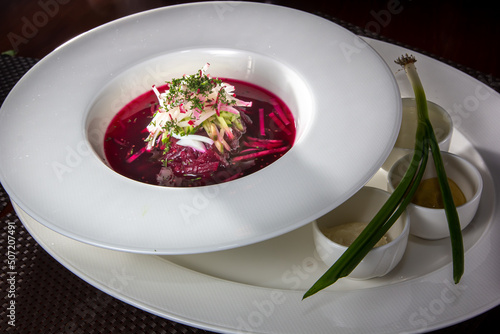 Cold borscht - speciality for hot days. Vegetable cold soup with beetroots. Shallow depth of field, selective focus
