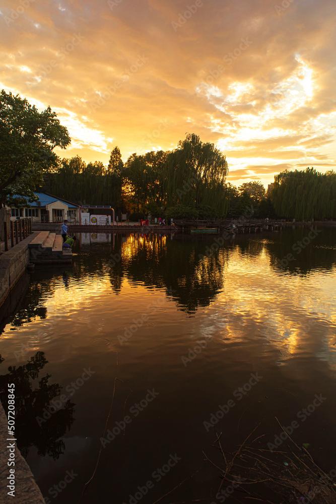 Fototapeta premium sunset over the river