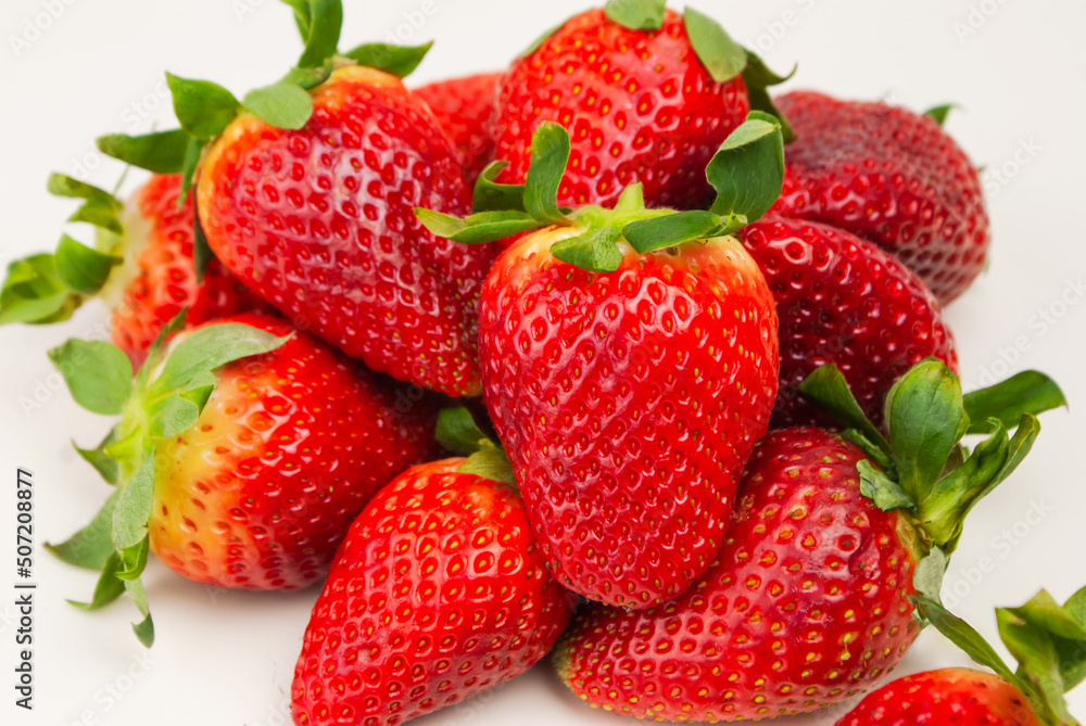 group of strawberries on a white background group of strawberries on a white background