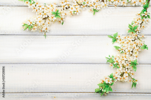 Spring background may flowers and April floral nature on wooden background. Branches of blossoming. Easter spring greeting cards with copy space. Springtime.