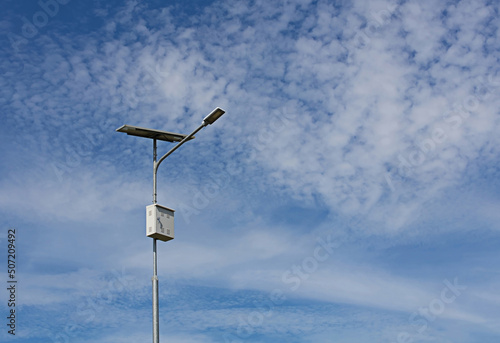 solar street light pole bright sky background